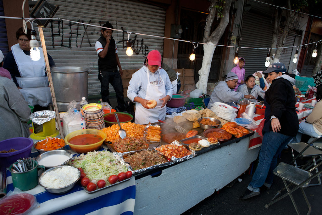 Street food vendors in Mexico City — learning enough Spanish to order at places like these transforms the expat experience